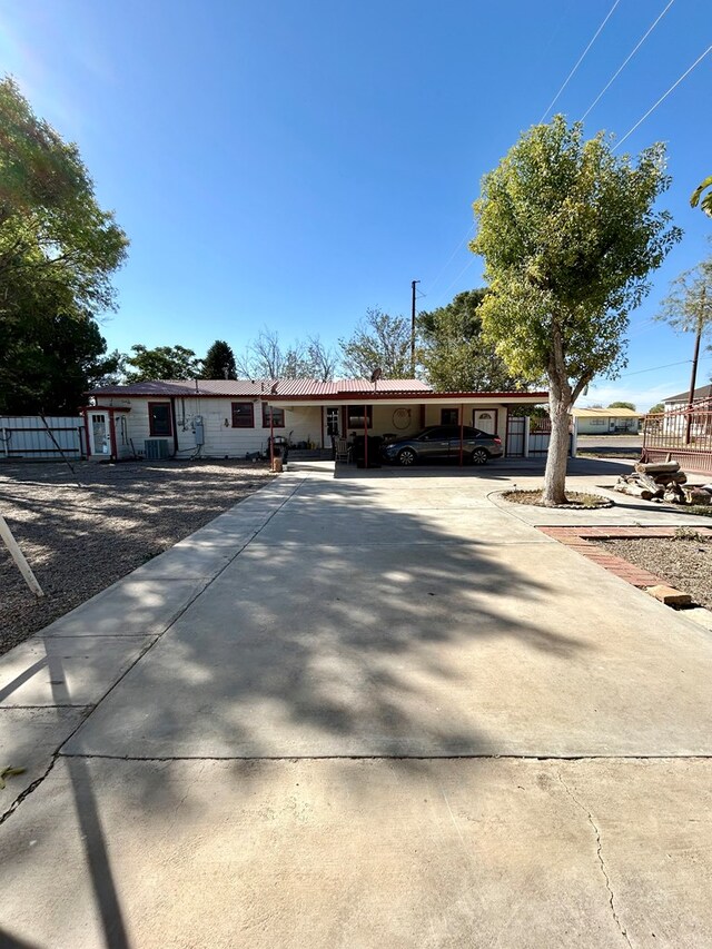 view of front of house with a carport