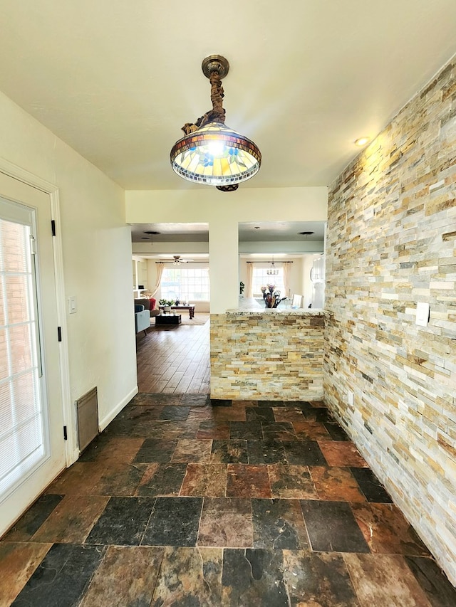2824 Cimmaron Ave, Midland, TX 79705 - corridor with stone tile floors