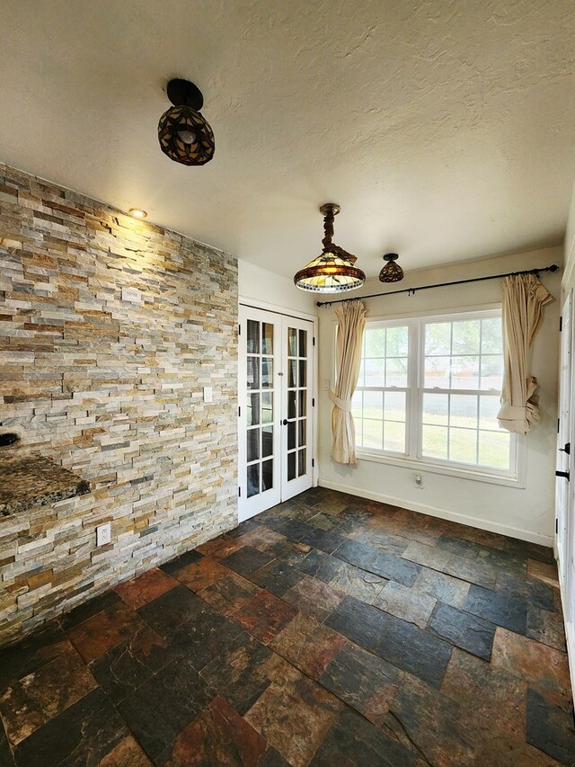 2824 Cimmaron Ave, Midland, TX 79705 - unfurnished sunroom featuring french doors