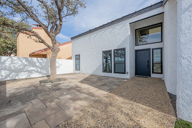 exterior space with a patio