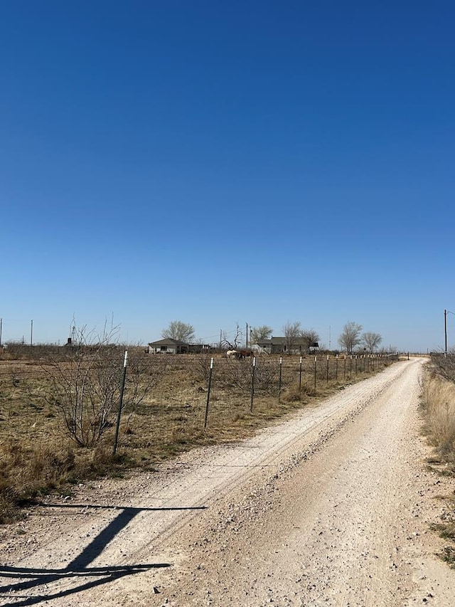 view of road featuring a rural view