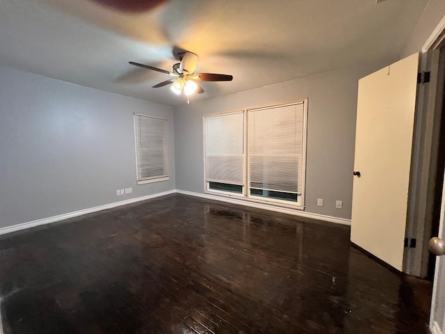 614 W Nobles Ave, Midland, TX 79701 - empty room with a ceiling fan, baseboards, and wood finished floors