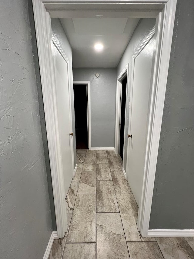 614 W Nobles Ave, Midland, TX 79701 - hallway with baseboards