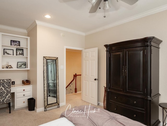 bedroom featuring ceiling fan, crown molding, and light colored carpet