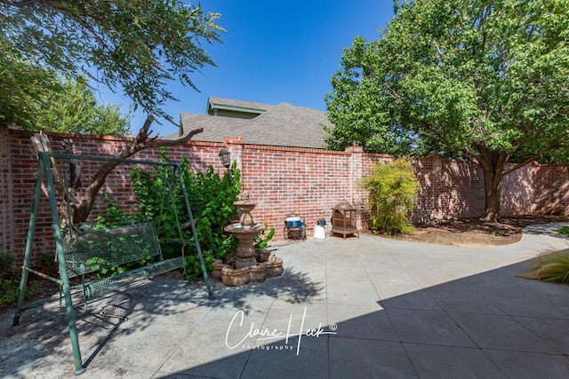 view of patio / terrace with fence