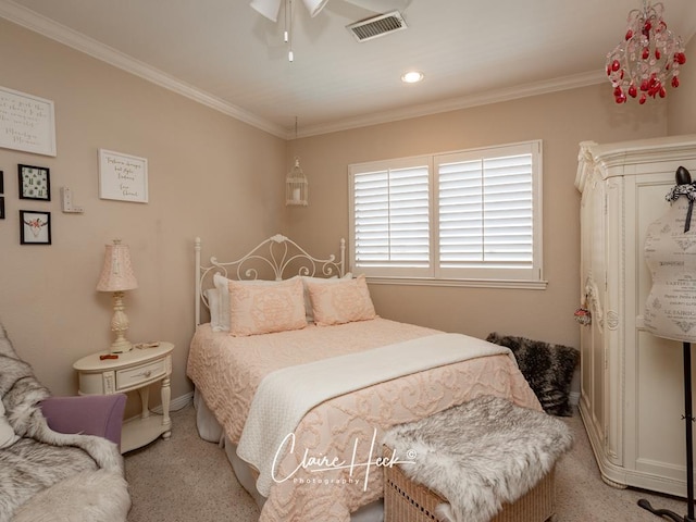 bedroom featuring visible vents, light carpet, crown molding, baseboards, and ceiling fan