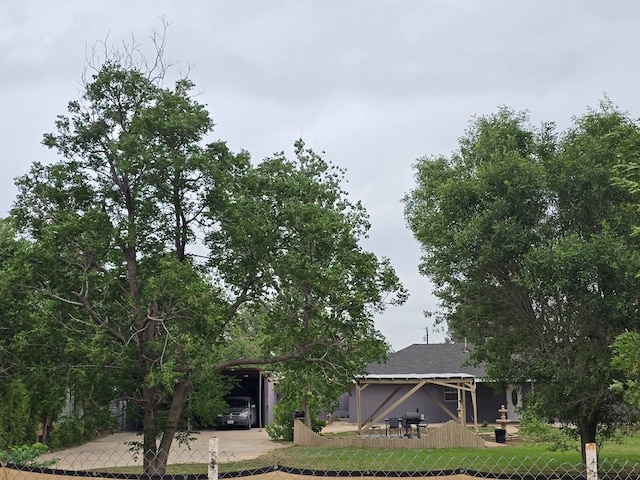 exterior space with a fenced front yard