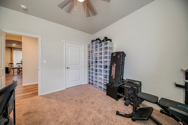 workout area featuring carpet and ceiling fan