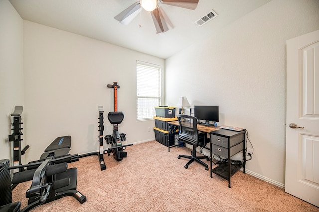 carpeted home office with ceiling fan