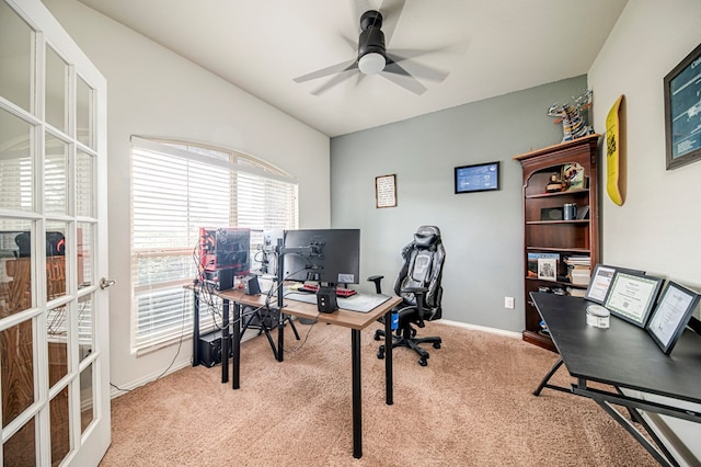 office space with ceiling fan, light carpet, and french doors