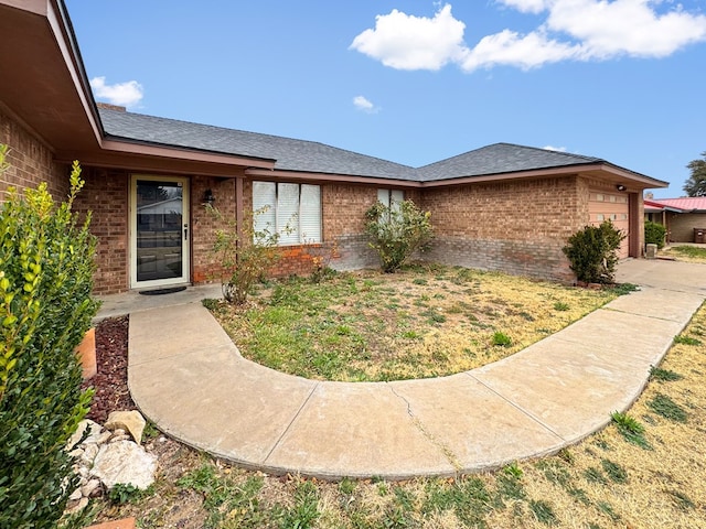 ranch-style home with a garage