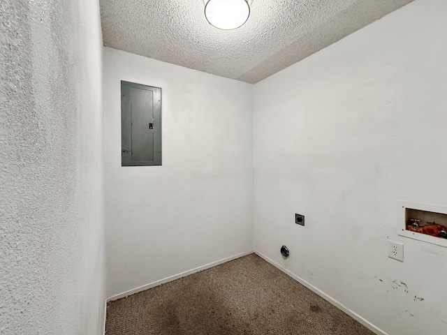 laundry room with hookup for a washing machine, electric panel, carpet, a textured ceiling, and hookup for an electric dryer