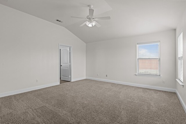 1306 Randolph Ln, Midland, TX 79705 - carpeted spare room with lofted ceiling, ceiling fan, and baseboards