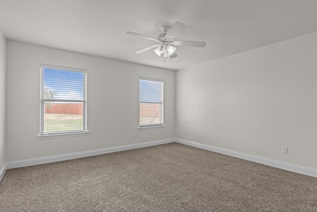 1306 Randolph Ln, Midland, TX 79705 - carpeted spare room with baseboards and a ceiling fan