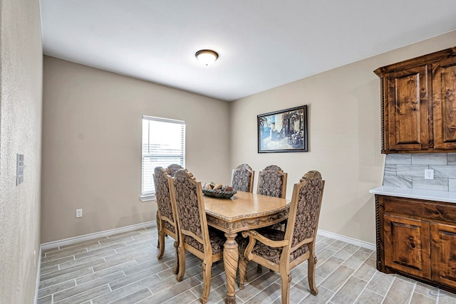 dining area with light wood-type flooring