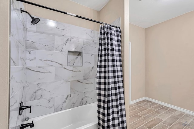 bathroom featuring shower / tub combo