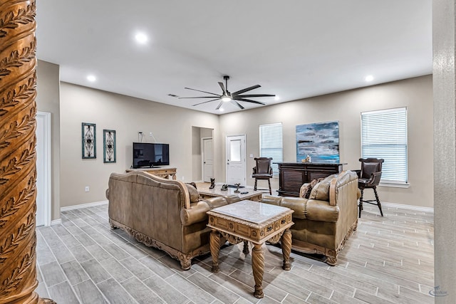 living room featuring ceiling fan