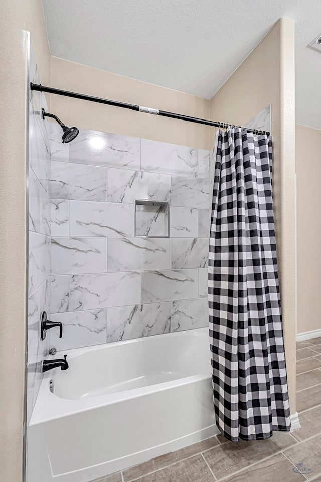 bathroom featuring shower / bath combo