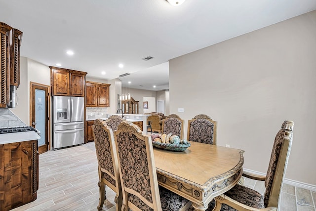 dining area featuring sink