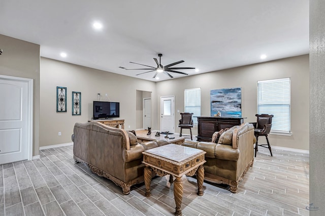 living room with ceiling fan