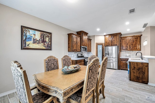 dining room with sink