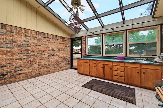 3013 Whittle Way, Midland, TX 79707 - sunroom / solarium with a skylight, a sink, and vaulted ceiling