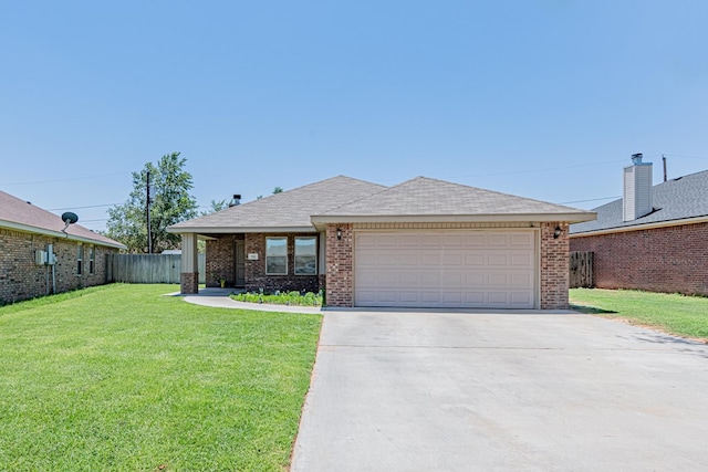 753 Shepherd Cir, Andrews, TX 79714 - ranch-style house featuring brick siding, an attached garage, driveway, and a shingled roof