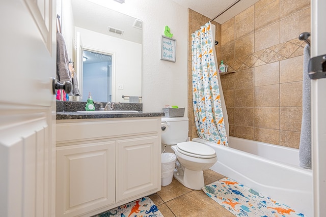 753 Shepherd Cir, Andrews, TX 79714 - full bath with tile patterned flooring, vanity, and shower / tub combo with curtain