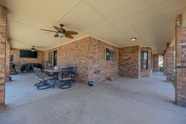 view of patio / terrace featuring ceiling fan