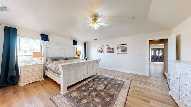 bedroom featuring ceiling fan and light wood-type flooring