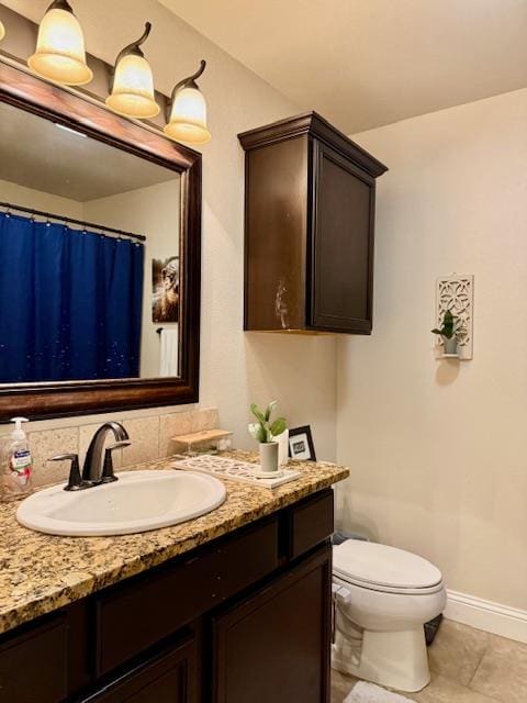 1406 Wrangler Ln, Midland, TX 79705 - full bath with vanity and tile patterned floors