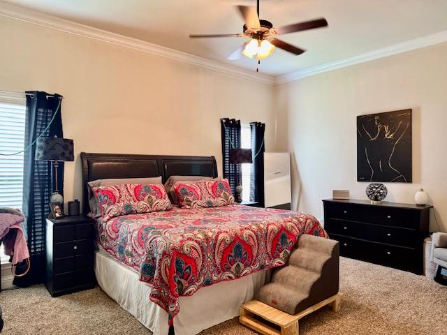 1406 Wrangler Ln, Midland, TX 79705 - bedroom featuring carpet flooring, crown molding, and ceiling fan