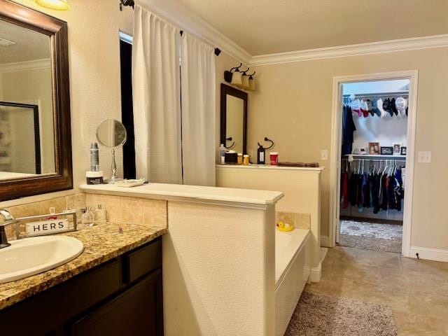 1406 Wrangler Ln, Midland, TX 79705 - bathroom with vanity, crown molding, a bath, a walk in closet, and a shower