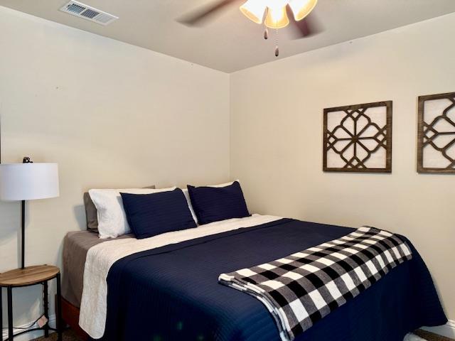 1406 Wrangler Ln, Midland, TX 79705 - bedroom with ceiling fan