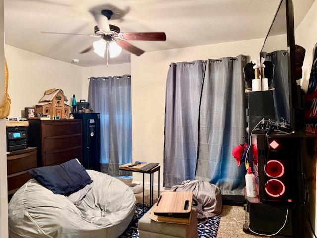1406 Wrangler Ln, Midland, TX 79705 - bedroom featuring ceiling fan