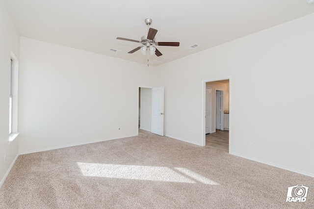 unfurnished bedroom with baseboards, visible vents, and carpet floors