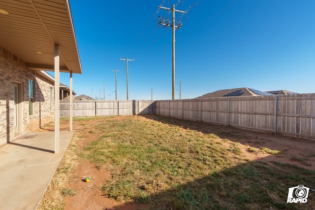 view of yard featuring a fenced backyard and a patio