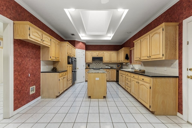 kitchen featuring light tile patterned floors, under cabinet range hood, black appliances, a sink, and a center island