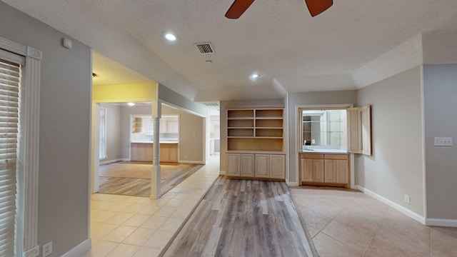 3608 Apollo Ct, Midland, TX 79707 - unfurnished room featuring light tile patterned floors, ceiling fan, baseboards, a textured ceiling, and recessed lighting