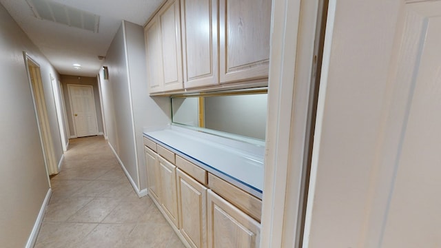 3608 Apollo Ct, Midland, TX 79707 - corridor featuring baseboards and light tile patterned floors