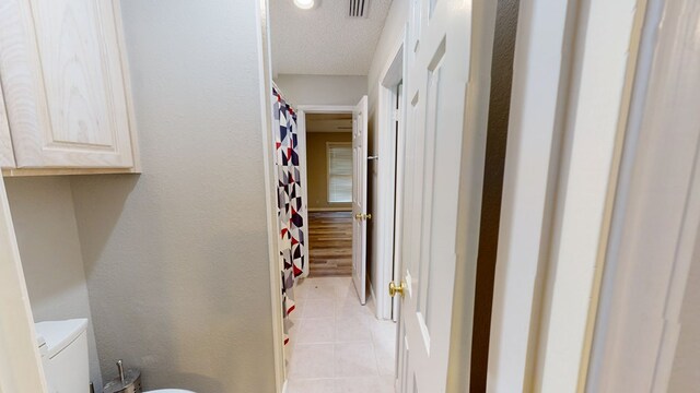 3608 Apollo Ct, Midland, TX 79707 - full bath with toilet, tile patterned flooring, a shower with curtain, and recessed lighting