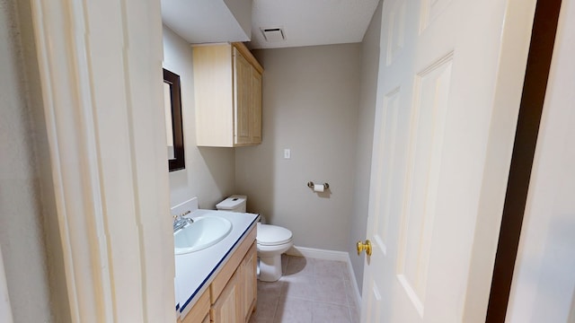 3608 Apollo Ct, Midland, TX 79707 - bathroom featuring toilet, vanity, tile patterned floors, and baseboards