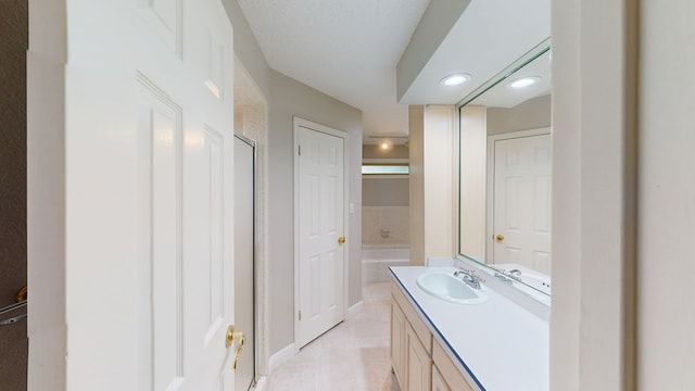 3608 Apollo Ct, Midland, TX 79707 - full bath with vanity, tile patterned flooring, and a shower with shower door