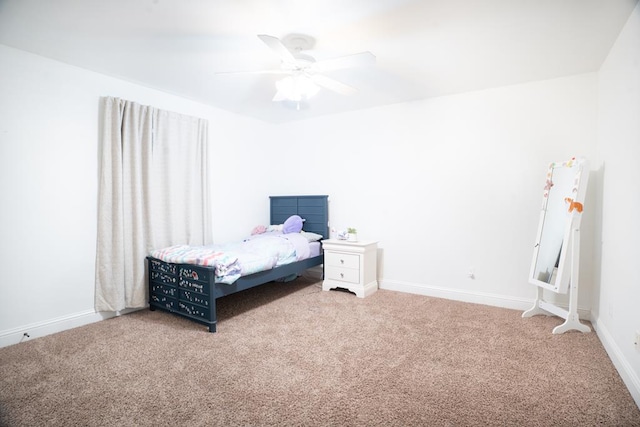 bedroom with carpet, baseboards, and ceiling fan
