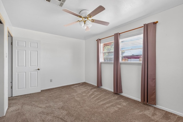 4709 Shadylane Dr, Midland, TX 79703 - carpeted empty room featuring a ceiling fan and baseboards