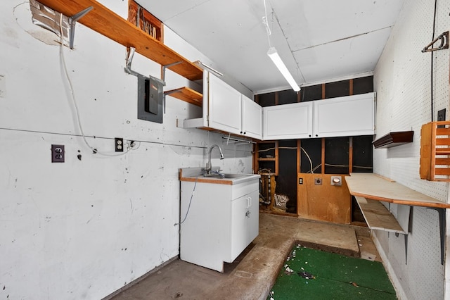 4709 Shadylane Dr, Midland, TX 79703 - basement with a sink and electric panel