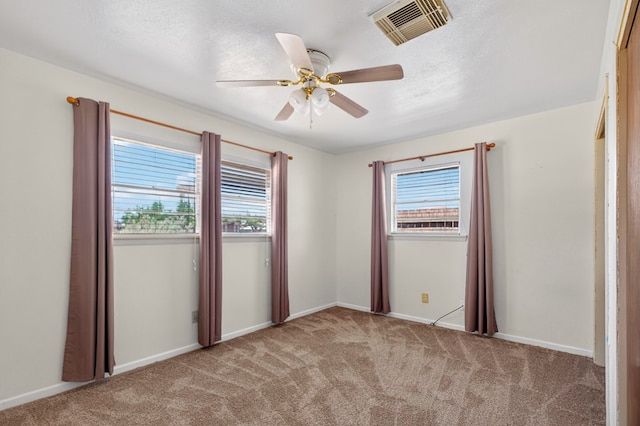 4709 Shadylane Dr, Midland, TX 79703 - carpeted spare room featuring healthy amount of natural light, ceiling fan, and baseboards