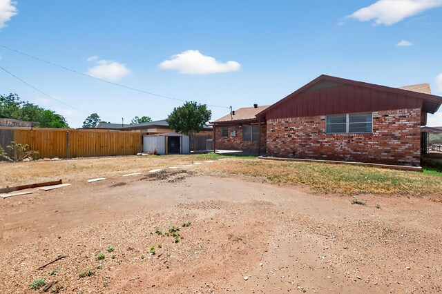 4709 Shadylane Dr, Midland, TX 79703 - rear view of house featuring brick siding