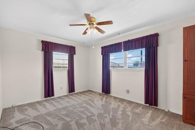 4709 Shadylane Dr, Midland, TX 79703 - unfurnished room with carpet flooring, ceiling fan, and baseboards