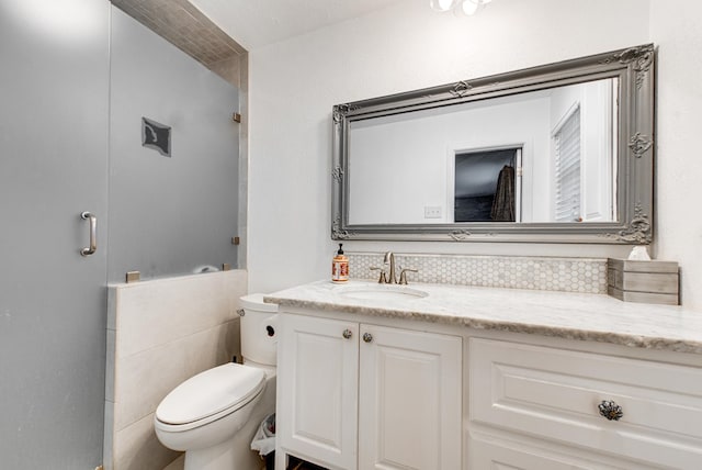2817 W Shandon Ave, Midland, TX 79705 - full bath with vanity, tasteful backsplash, toilet, and a shower